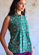 woman wearing green Indian cotton blouse 