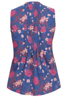 Back view of navy blue floral print sleeveless top with flared hem and vertical decorative pleats at the center of the back 