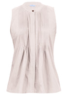 Sleeveless 100% cotton top in natural white with tiny decorative pleats, mandarin collar and a button 