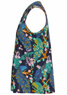 Side view of  100% cotton sleeveless top with decorative vertical pleats and mandarin buttoned collar