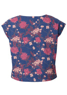 Back view of navy blue floral print top with cap sleeves and high round neckline