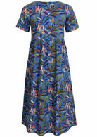 Front mannequin photo of cotton midi length dress with short sleeves and tiered skirt