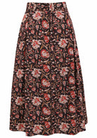 Black based traditional Indian floral print cotton skirt on a white background.