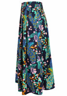 Side view of mid-length button through cotton skirt with box pleats, pockets and belt loops