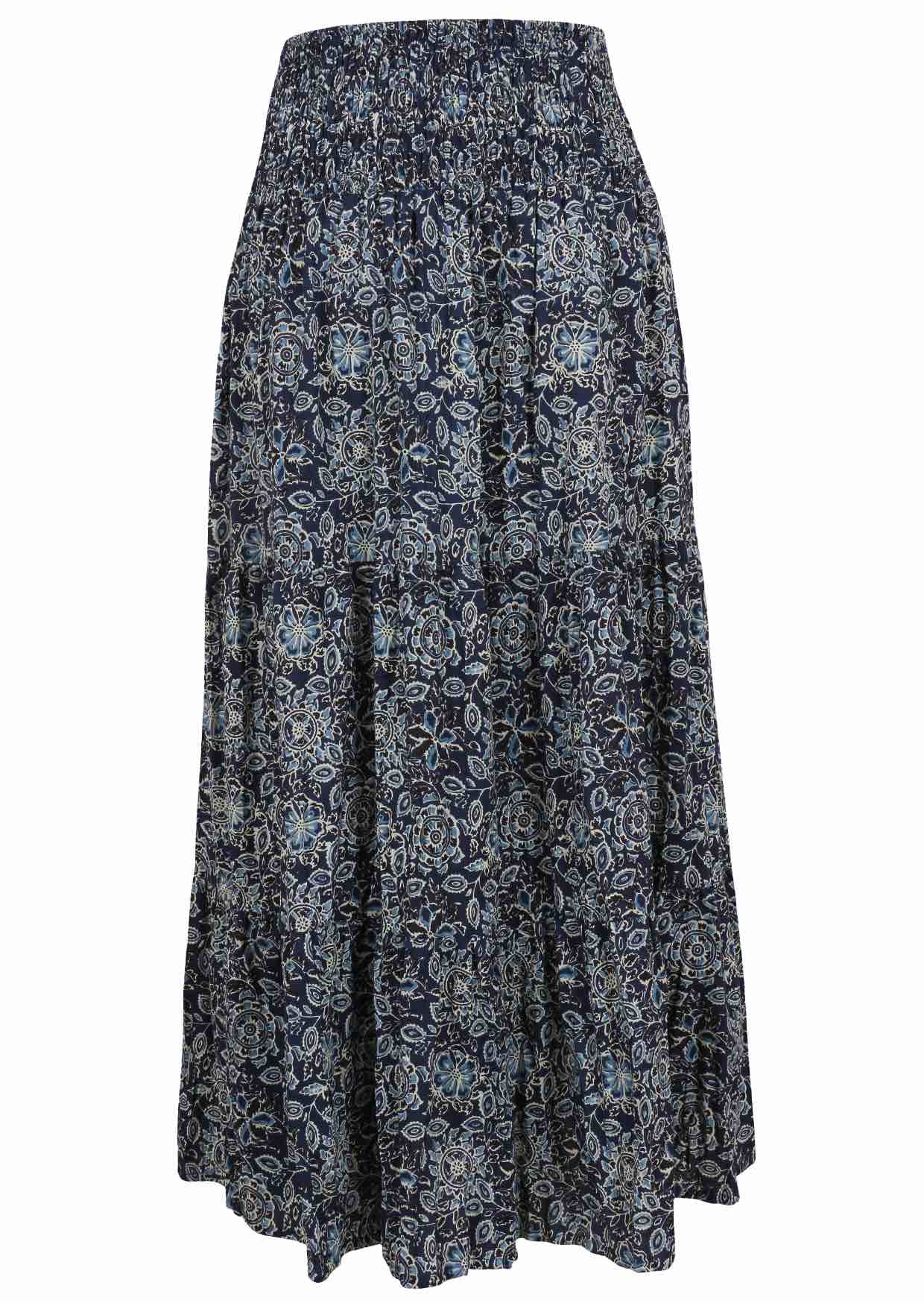 Navy blue based floral print skirt on a white background.