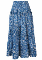 Back mannequin photo of cotton maxi skirt with wide shirred elastic waistband in blue floral print