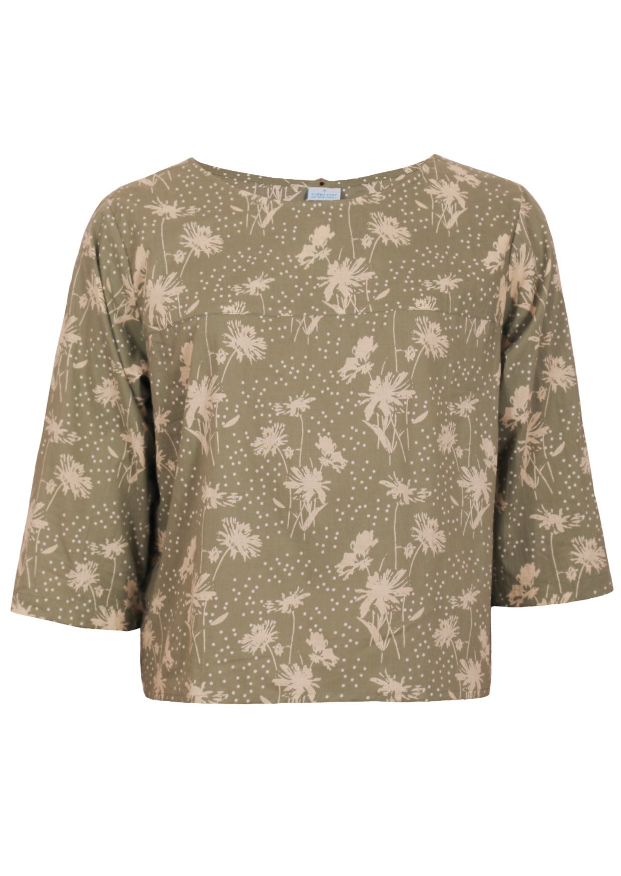 Front mannequin photo of cotton 3/4 sleeve boxy top in pale green based floral print