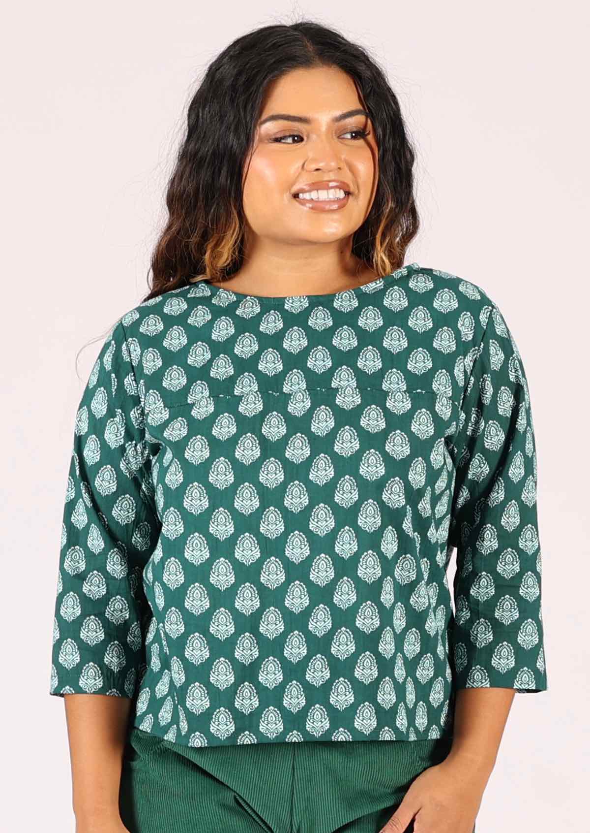 Relaxed fit cotton top in green base pendant print, great for office or play