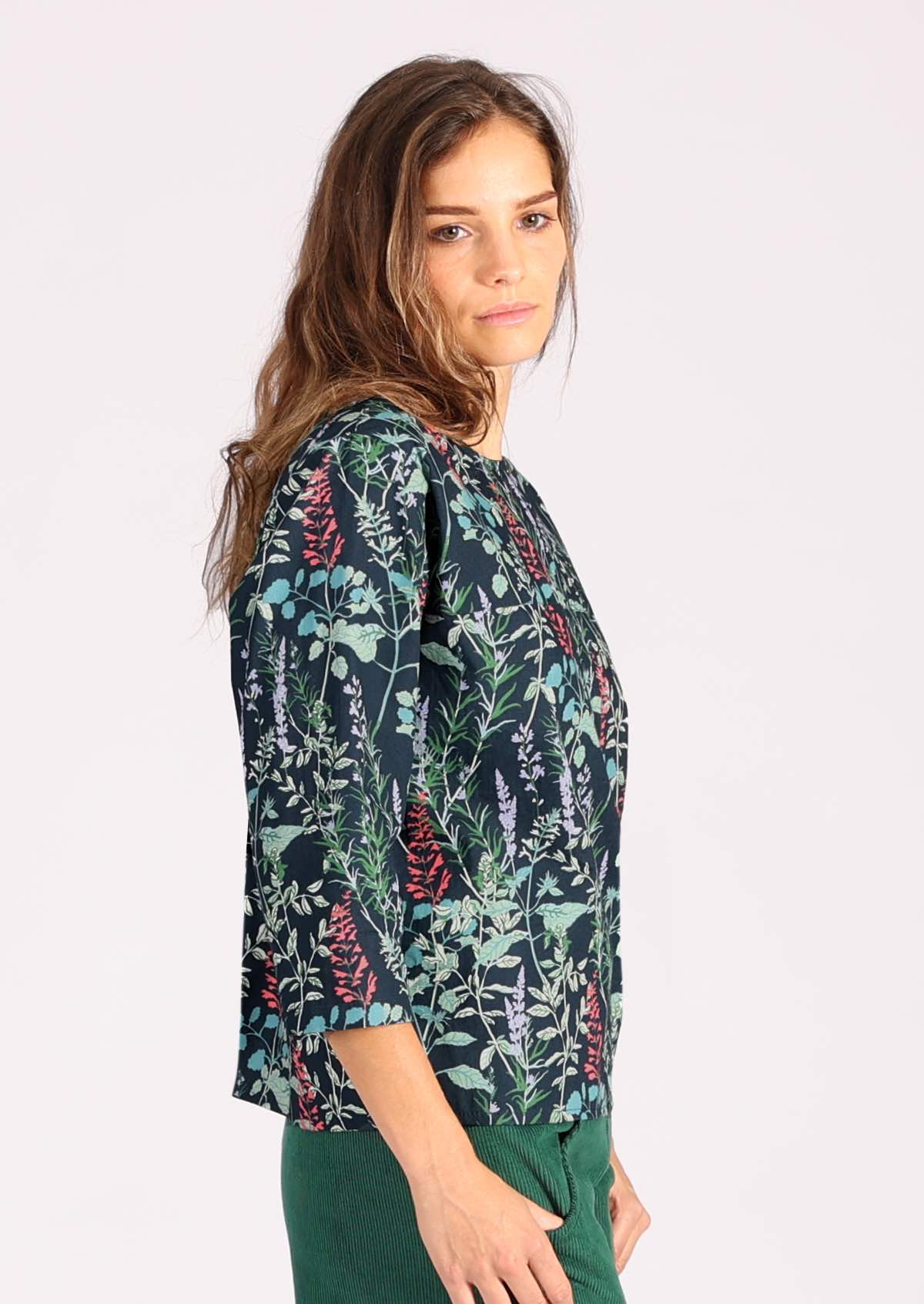Loose fit cotton floral top with 3/4 sleeves and high round neckline