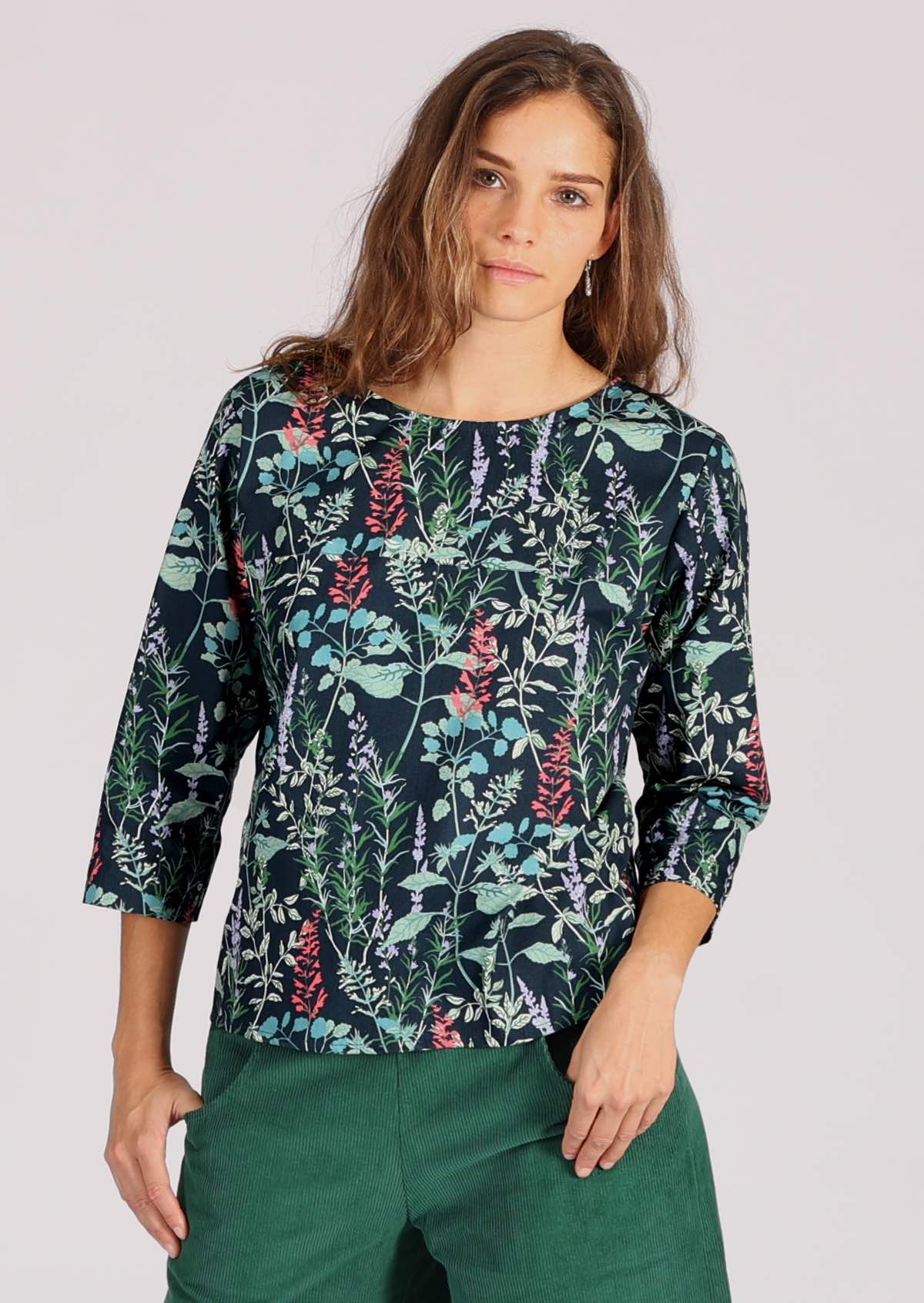 100% cotton top with floral print on dark teal base
