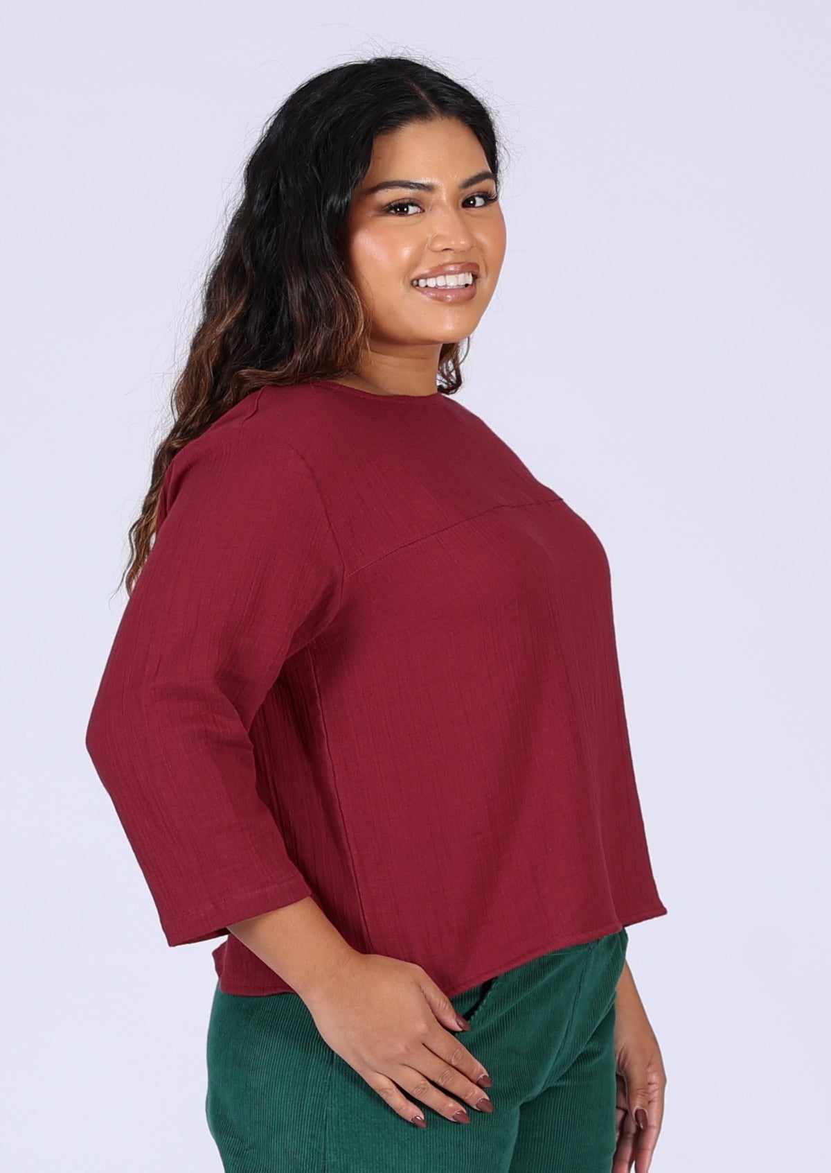 Deep red top made from two layers of lightweight cotton gauze