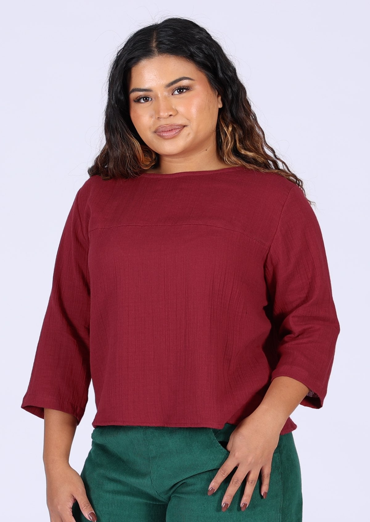 Warm red cotton gauze top with 3/4 sleeves and high round neckline