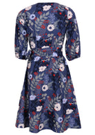 100% cotton wrap dress in blue with white flowers and long sleeves back view