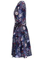 100% cotton wrap dress in blue with white flowers and long sleeves side view