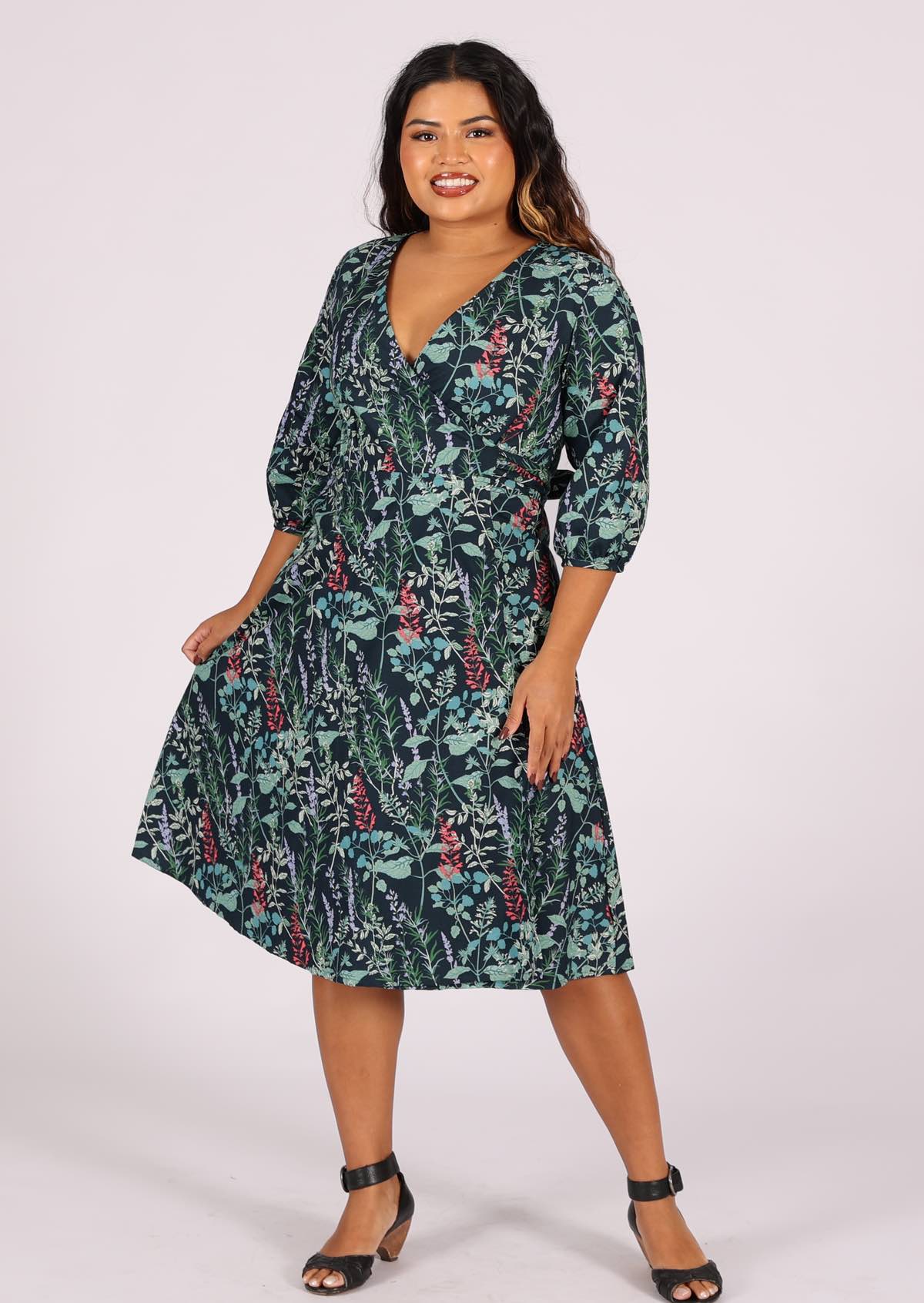 Cotton wrap dress below knee length with A-line skirt and 3/4 sleeves