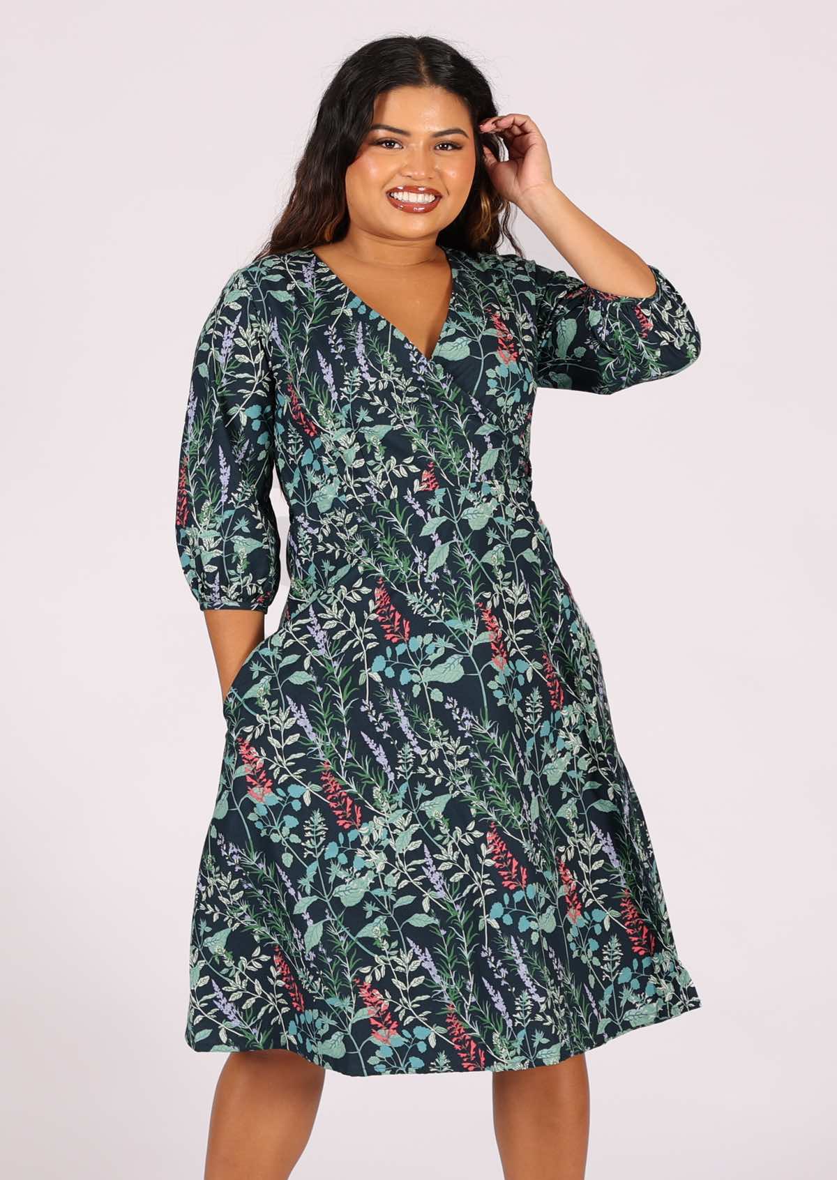 100% cotton wrap dress in gorgeous floral print on dark teal base