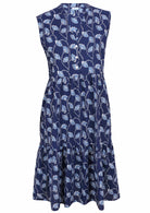 100% cotton sleeveless navy blue based floral print dress with buttoned bodice, mandarin collar and two tiered skirt 