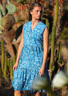 woman in blue floral cotton sundress 