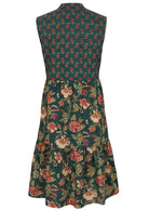 Back view of sleeveless, below knee length cotton dress with two tiered skirt in green based floral print 