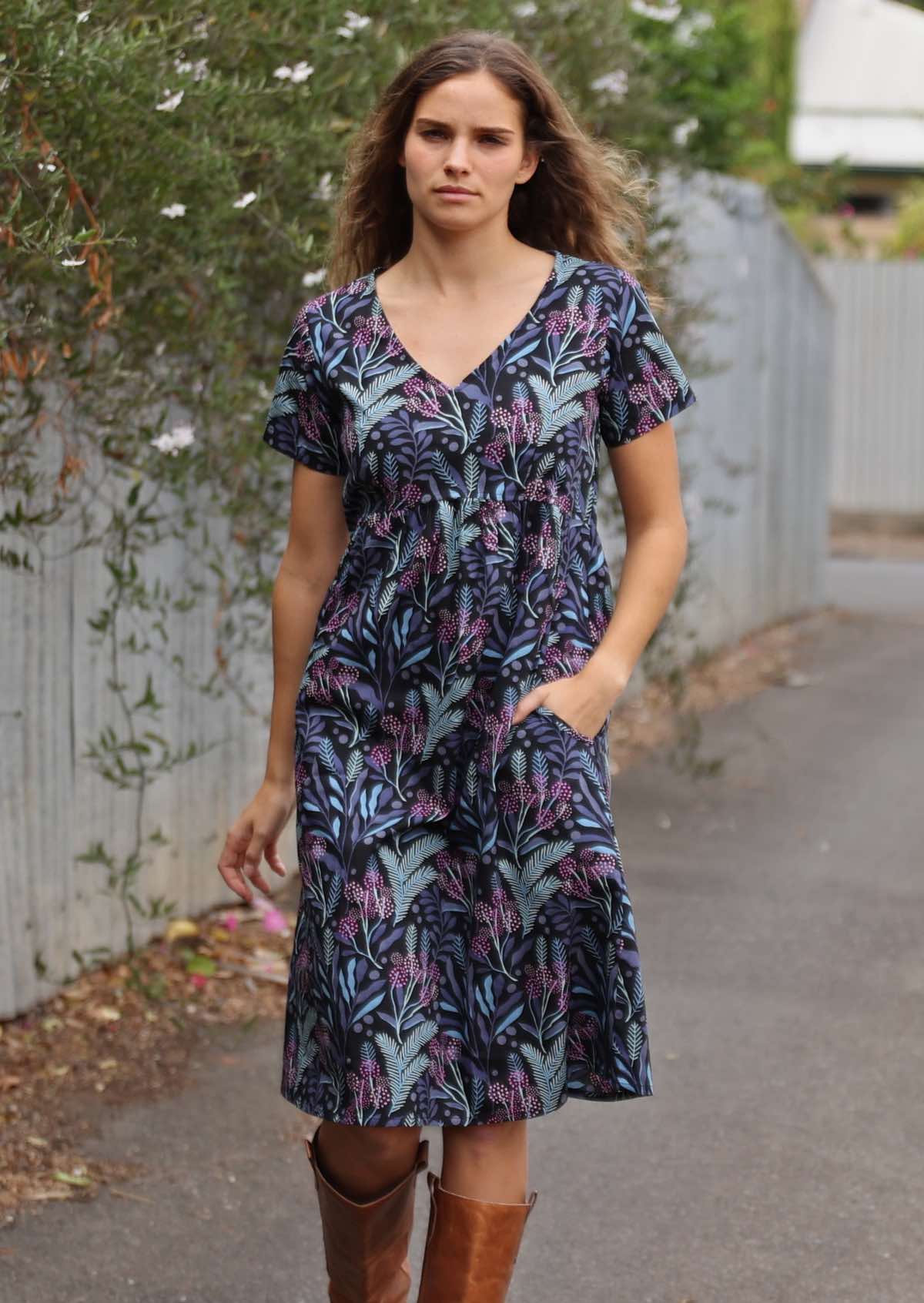 Relaxed fit cotton dress with empire waistline and pockets