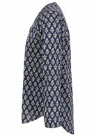 Long sleeve cotton top that is longer at the back with navy blue based floral print