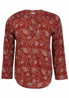 Lightweight 100% cotton long sleeve top with red based floral print.