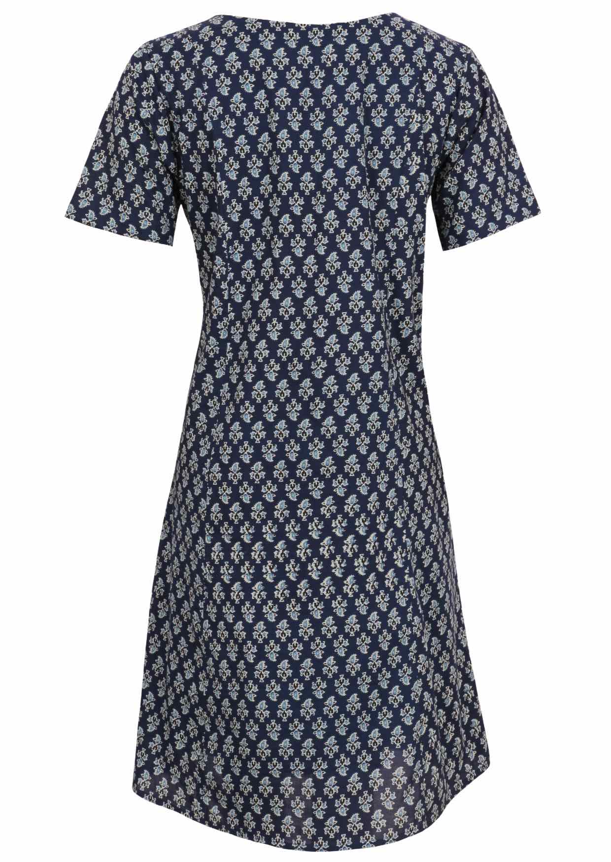 Back view of cotton dress with round neckline in navy blue based floral print. 