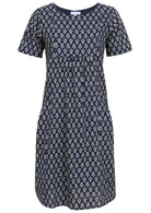 Front view of cotton dress with round neckline in navy blue based floral print