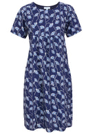 Front view of cotton dress with round neckline in navy blue based floral print