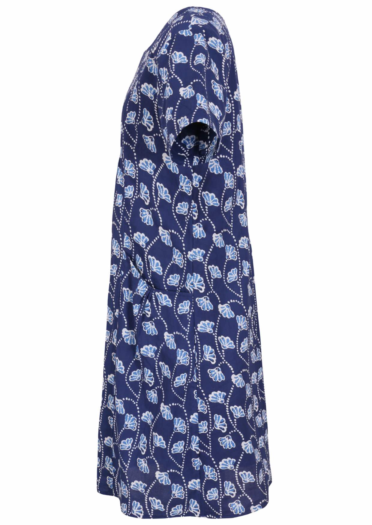 Side view of cotton dress with round neckline and short sleeves in navy blue based floral print. 