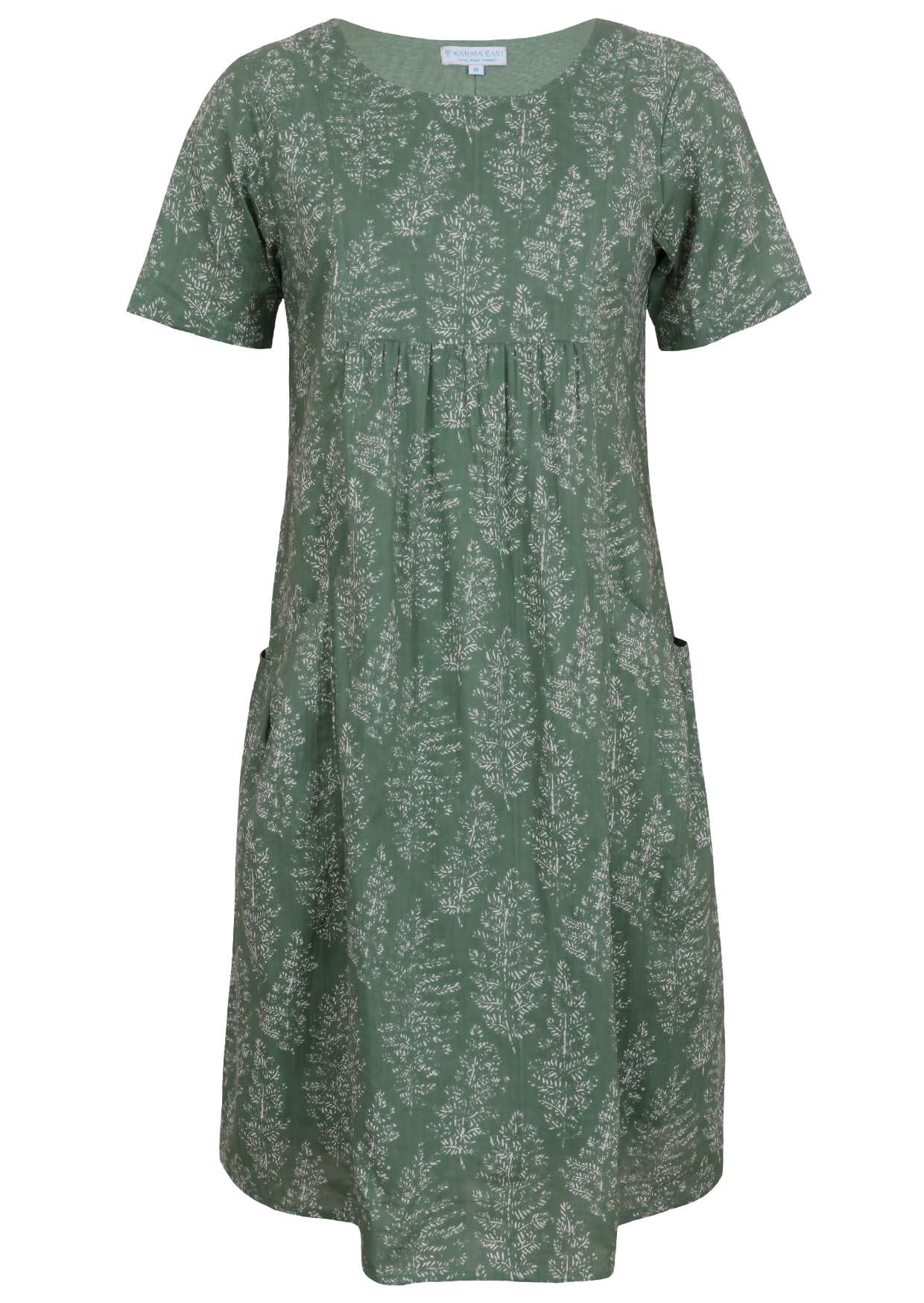 Front view of cotton dress with round neckline in sage green based floral print