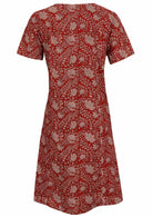 Back view of cotton dress with round neckline in red based floral print. 