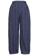 Navy blue based print pants on a white background