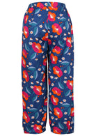 Back view of 100% cotton wide leg pants with elastic waist and pockets in royal blue based floral print