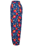 Side view of floral print wide leg cotton pants with pleated ankles, high elastic waist and pockets