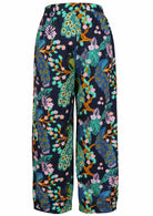 Back view of colorful floral-patterned pants with elastic waist
