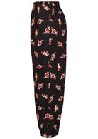 Side view of floral print wide leg cotton pants with pleated ankles, high elastic waist and pockets