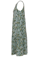 Side view of relaxed fit tiered cotton dress with sleeveless design in sage green based floral print