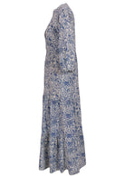 White based blue floral print long cotton dress on a white background.