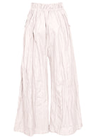 Back view of cotton wide leg pants in natural white with elasticated waist and pockets