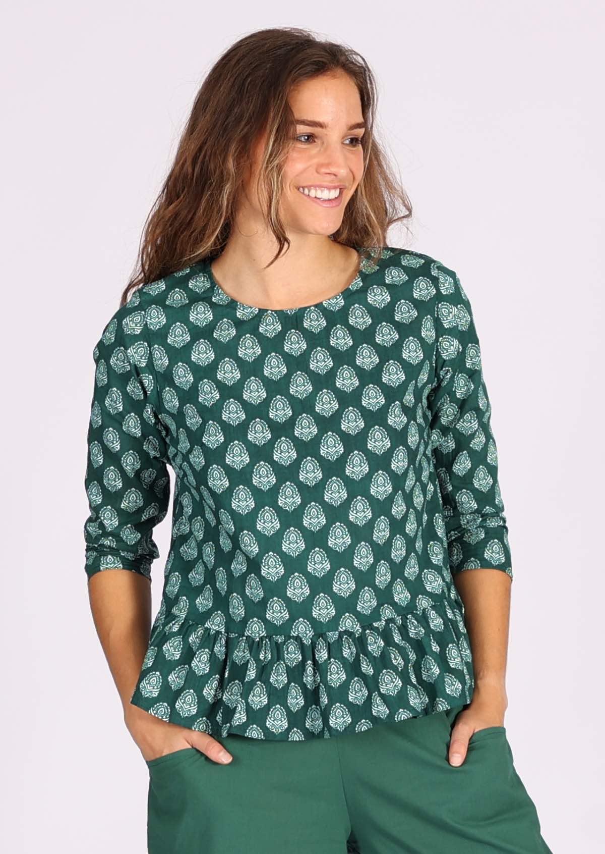 100% cotton top with 3/4 sleeves and peplum frill