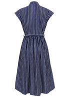Back view of navy blue based print cotton cap sleeves dress.
