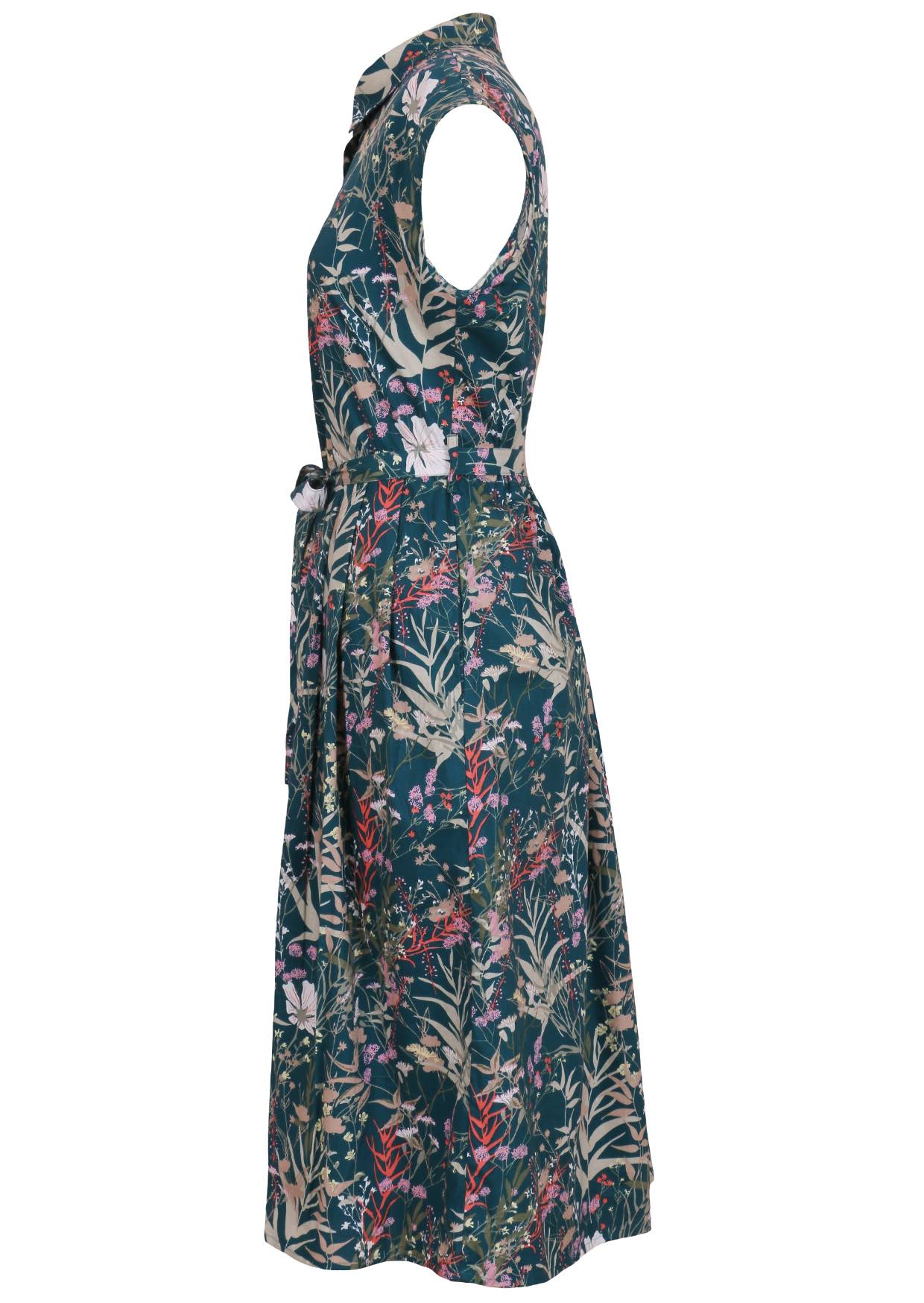Side view of teal based floral print cotton dress with pockets.