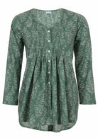 Sage green based floral print cotton button through shirt with pin tucks across the bodice and a V-neckline