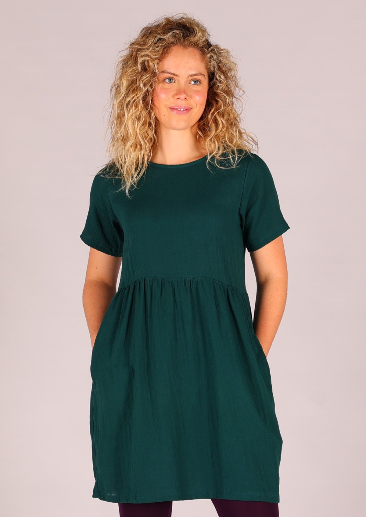 Double cotton relaxed fit dress with T-shirt sleeves, high round neckline and hidden side pockets