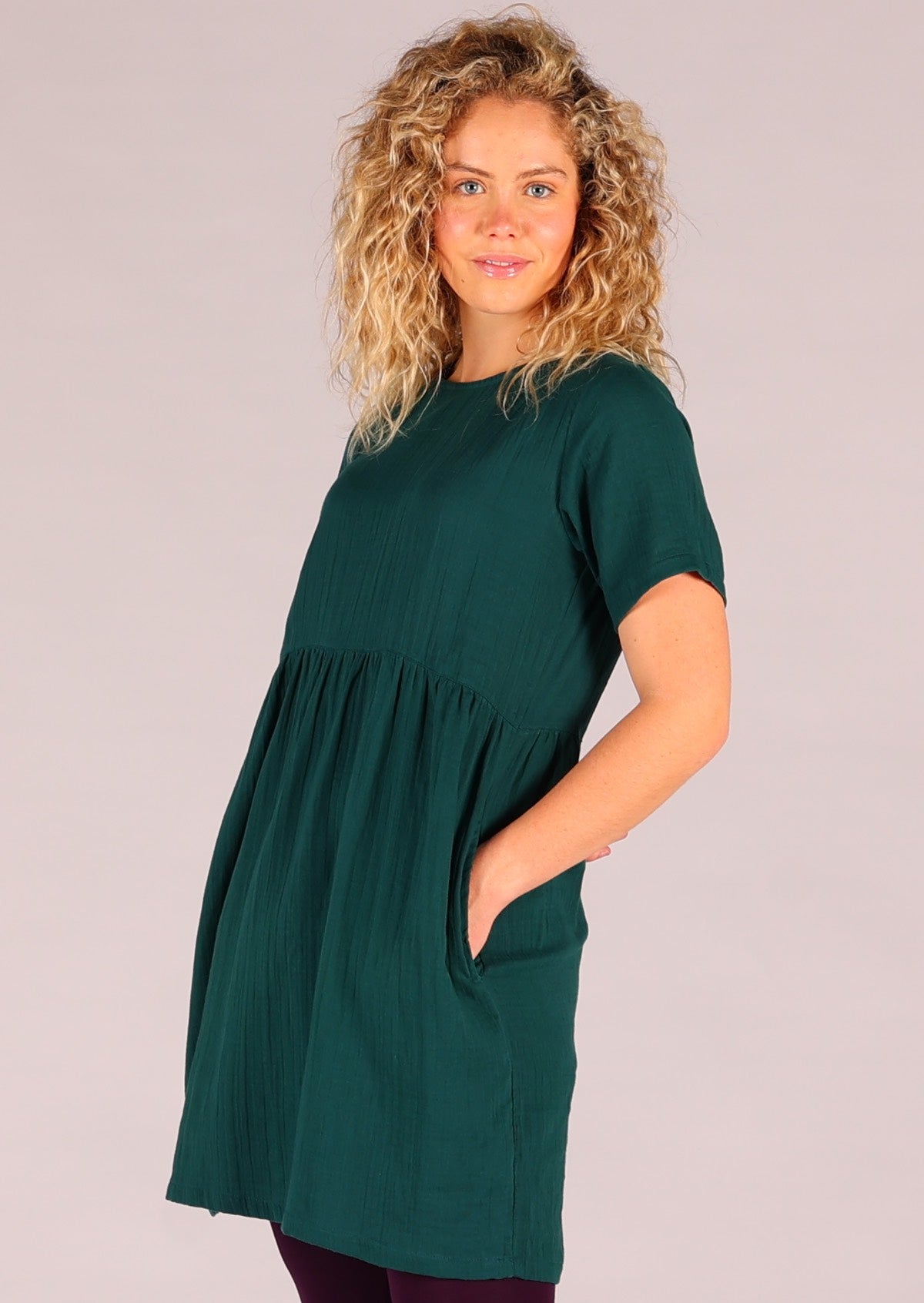 Double cotton relaxed fit dress that sits above the knee and has hidden side pockets
