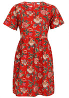 100% cotton above knee length loose fitting dress with short sleeves and high round neckline in red based floral print