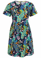 100% cotton above knee length loose fitting dress with short sleeves and high round neckline in navy blue based floral print