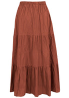 Back view of rust shade 100% cotton skirt with elasticated waistband and drawstring