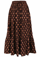 100% Cotton maxi skirt with three tiers and drawstring in floral print on earthy brown base.